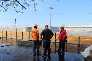Our staff surveying the roof for proper placement of the unit